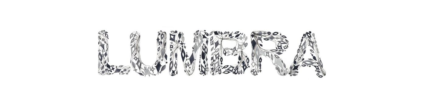 LUMBRA dibujado a tinta, con las letras rellenas de gemas